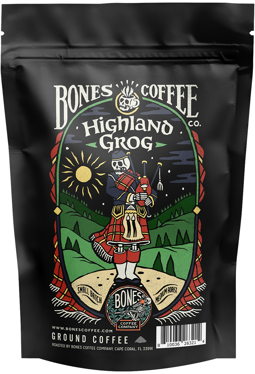 The front of a 4 ounce bag of Bones Coffee Company Highland Grog coffee. Its flavor is butterscotch and caramel, and it has a skeleton in a kilt playing bagpipes on top of a hill on the art.
