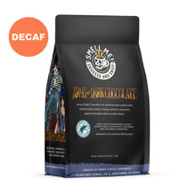 The back of a 12 oz flavored coffee bag named Army of Dark Chocolate. The Rain Forest Alliance page on the lower left of the back of the bag, and it says to squeeze and sniff at the top of the bag. Below the squeeze and sniff text is the name Army of Dark Chocolate. There is a sticker saying decaf.