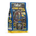 The front of a 12 ounce bag of Bones Coffee Company Atomic Apple flavored coffee. It is apple pie flavored, and it has Lucy from Amazon and Zenimax’s Fallout show on the art.