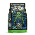 The front of a 12 ounce bag of Bones Coffee Company Frankenbones coffee. Its flavor is chocolate hazelnut, and it has a green skeleton with blue and green electricity scattered around on the art.