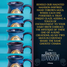On the left is a mug inspired by Disney Haunted Mansion. The mug is colored black, but the glaze varies from shades of blues and purples. On the right the text says that each Haunted Mansion inspired hand-thrown mug has a unique glaze. At the bottom of this text is the Disney Haunted Mansion logo.