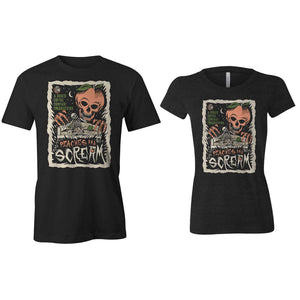 The front of the women's and men's Peaches and Scream tee shirts. It is colored black and has the art of the Peaches and Scream coffee on them. It showcases a skeleton on a couch in a pair of boxers with peaches on them while a peach with a skeletal face and hands leans towards them on the art.