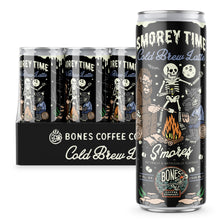 A 12-pack of cold brew lattes. Inside the pack is the S’morey Time cold brew lattes. A single can of this cold brew latte is on the side and has a skeleton holding a flashlight with bigfoot and a werewolf around a campfire making s’mores on the art.