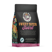 The back of a 12 ounce flavored coffee bag named Sweet Tater Swirl. The Rain Forest Alliance page on the lower left of the back of the bag, and it says to squeeze and sniff at the top of the bag. Below the squeeze and sniff text is the name Sweet Tater Swirl.