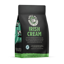 The back of a 12 ounce flavored coffee bag named Irish Cream. The Rain Forest Alliance page on the lower left of the back of the bag, and it says to squeeze and sniff at the top of the bag. Below the squeeze and sniff text is the name Irish Cream.
