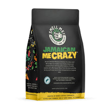The back of a 12 ounce flavored coffee bag named Jamaican Me Crazy. The Rain Forest Alliance page on the lower left of the back of the bag, and it says to squeeze and sniff at the top of the bag. Below the squeeze and sniff text is the name Jamaican Me Crazy.