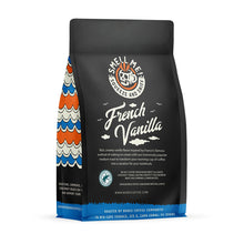 The back of a 12 ounce flavored coffee bag named French Vanilla. The Rain Forest Alliance page on the lower left of the back of the bag, and it says to squeeze and sniff at the top of the bag. Below the squeeze and sniff text is the name Bananas Foster.
