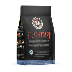The back of a 12 ounce flavored coffee bag named French Toast. The Rain Forest Alliance page on the lower left of the back of the bag, and it says to squeeze and sniff at the top of the bag. Below the squeeze and sniff text is the name French Toast.