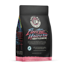 The back of a 12 ounce flavored coffee bag named Electric Unicorn. The Rain Forest Alliance page on the lower left of the back of the bag, and it says to squeeze and sniff at the top of the bag. Below the squeeze and sniff text is the name Electric Unicorn.