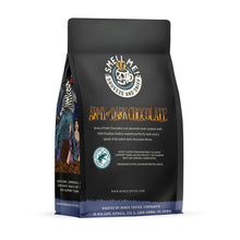 The back of a 12 ounce flavored coffee bag named Army of Dark Chocolate. The Rain Forest Alliance page on the lower left of the back of the bag, and it says to squeeze and sniff at the top of the bag. Below the squeeze and sniff text is the name Army of Dark Chocolate.