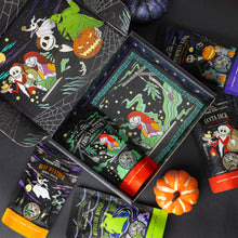 The collector's box inspired by Disney Tim Burton's The Nightmare Before Christmas. The art inside the box shows characters from the movie and five four ounce bags of flavored coffee inspired by Disney Tim Burton's The Nightmare Before Christmas.