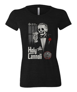 The front of the Holy Cannoli women's tee shirt. It is colored black has the art of the Holy Cannoli coffee on it.The art has a skeleton holding a cannoli like a cigar dressed in a suit with a red rose on its lapel.