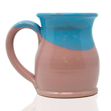 The back of the What the Fluff mug. It is cotton candy colored and has a powder-blue glaze on top of it.