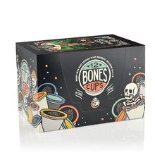 The side of the box for the Highland Grog Bones Cups. It showcases that it holds 12 Bones cups and has skeletons peeking out from behind and inside Bones Cups along the box.