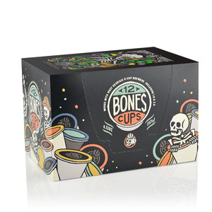 The side of the box for the Bananas Foster Cups. It showcases that it holds 12 Bones cups and has skeletons peeking out from behind and inside Bones Cups along the box.