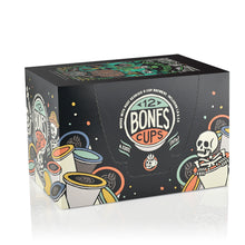 The side of the box for the Irish Cream Bones Cups. It showcases that it holds 12 Bones cups and has skeletons peeking out from behind and inside Bones Cups along the box.