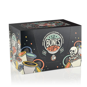 The side of the box for the Jingle Bones Cups. It showcases that it holds 12 Bones cups and has skeletons peeking out from behind and inside Bones Cups along the box.