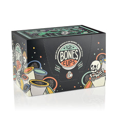 The side of the box for the Mint Invaders from Chocolate Space Cups. It showcases that it holds 12 Bones cups and has skeletons peeking out from behind and inside Bones Cups along the box.
