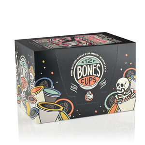 The side of the box for the Strawberry Cheesecake Cups. It showcases that it holds 12 Bones cups and has skeletons peeking out from behind and inside Bones Cups along the box.