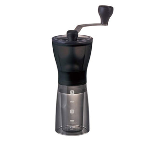 A black colored Hario mini-slim plus ceramic coffee mill.